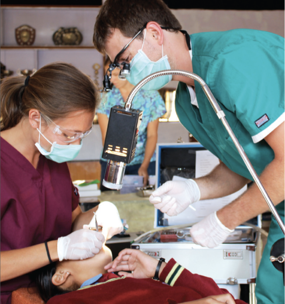Dr. Jesse Hollander and Dr. Erica Hollander treat a patient in Ladakh, India, in 2013